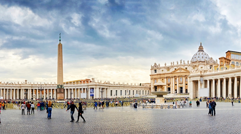 VATICAN CITY VATICAN - OCTOBER 29: Tourists visiting the Square and the Basilica of St. Peter in Rome on October 29 2014
