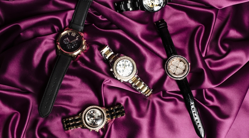set of six jewelry watches on red silk