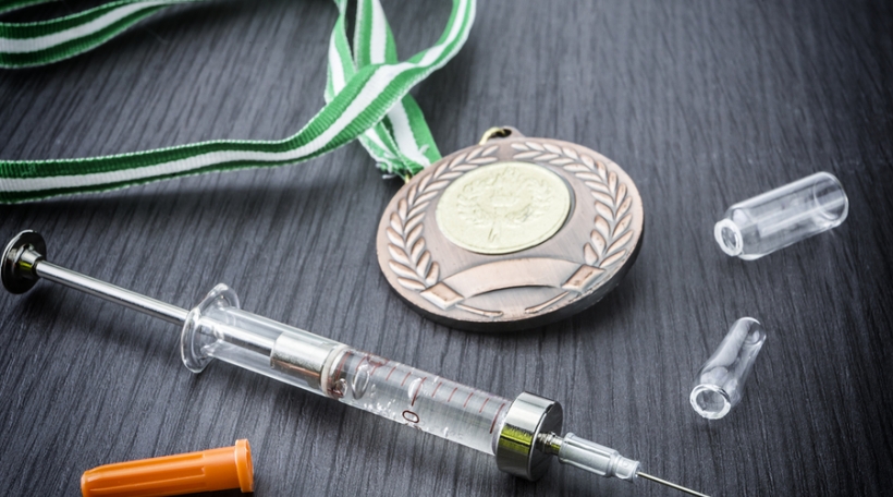 Doping in sport concept, Vial open next to a gold medal
** Note: Soft Focus at 100%, best at smaller sizes