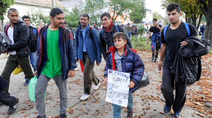 NOVA PAZOVA, SERBIA - CIRCA OCTOBER 2016: Migrants from Middle East walks to Hungarian border, circa October 2016 in Nova Pazova