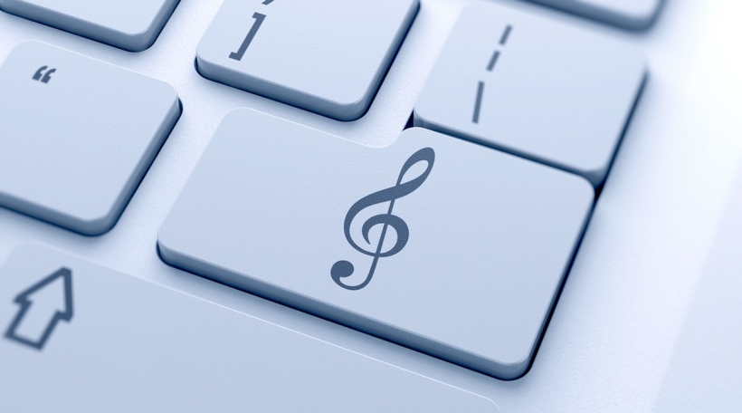 Solschlëssel op Tastatur