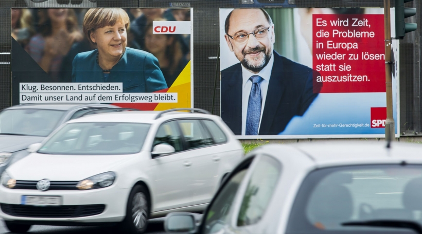 Wahlplakater vu Merkel a Schulz