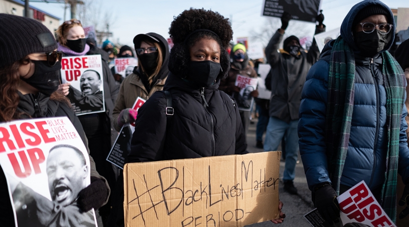 Black Lives Matter protesters march down St. Paul's University Avenue in honor of Martin King Luther Jr. Day. January 18, 2021. (Photo by Tim Evans/NurPhoto)